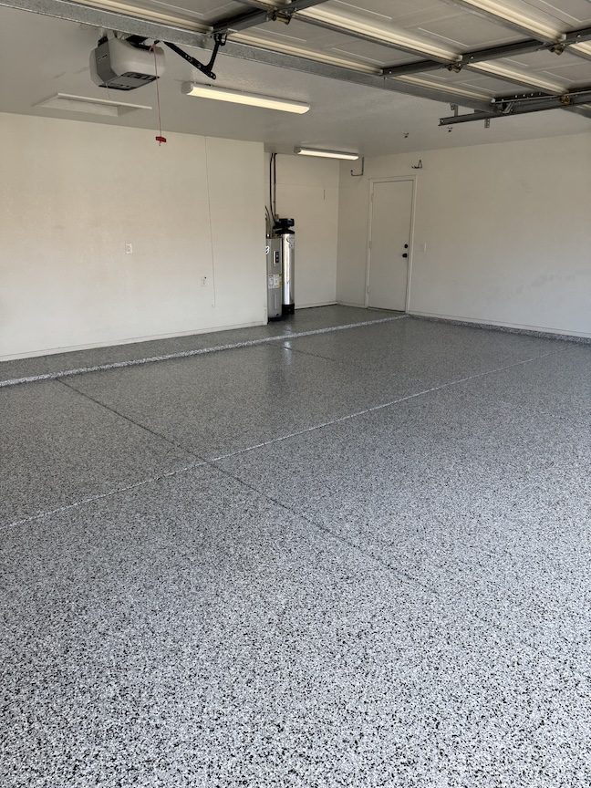 Two-car garage polyaspartic floor coating, finished result — East Valley, AZ